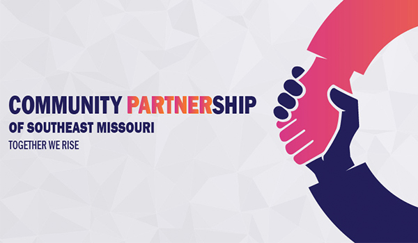 community Partnership banner with logo
